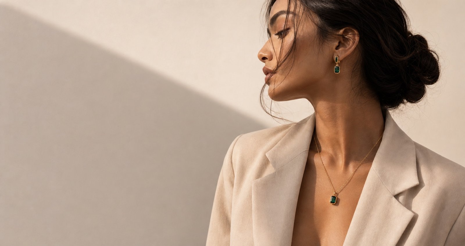 Model wearing YARA emerald jewellery